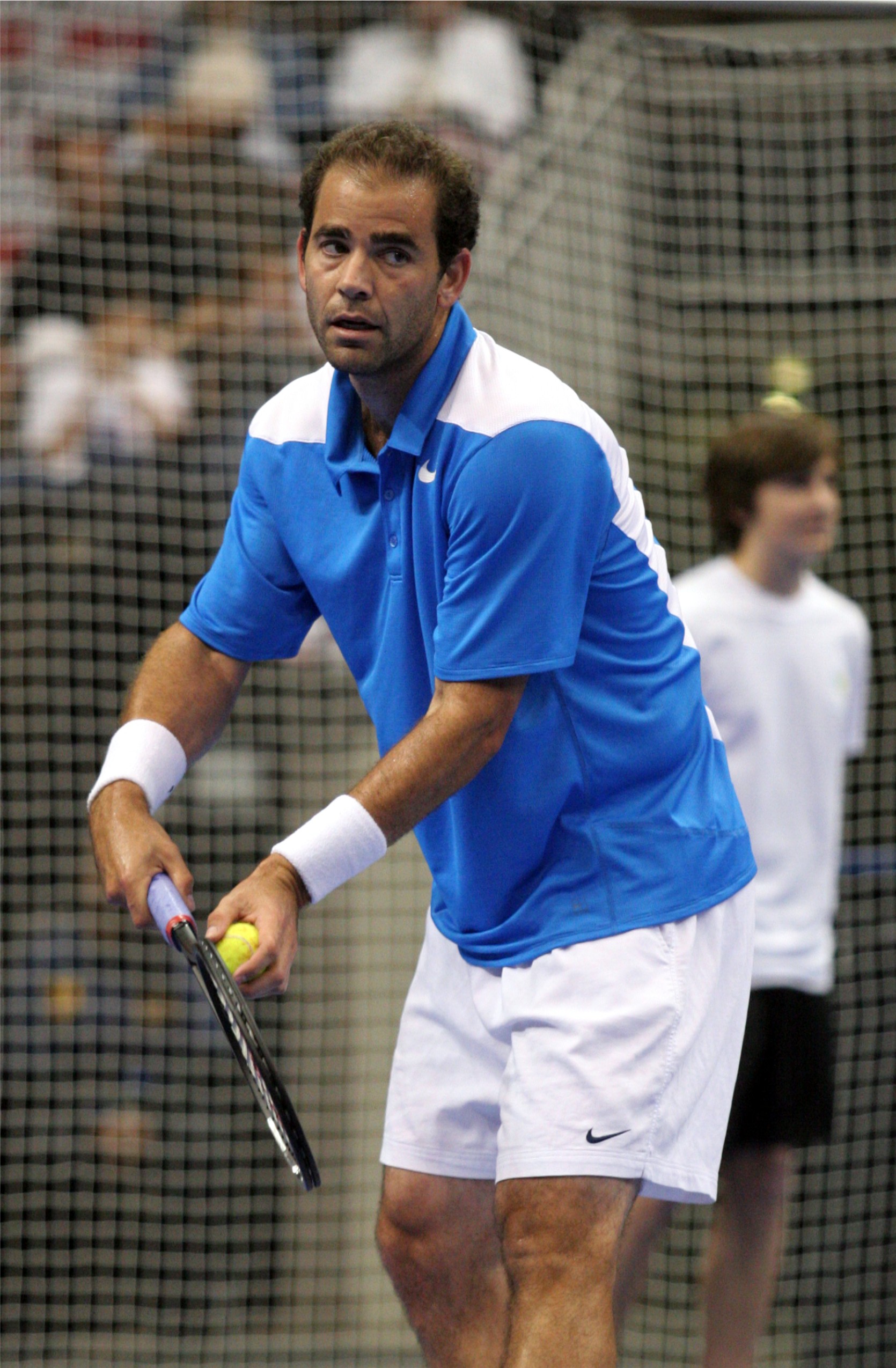 Imagem de referência relacionada a Pete Sampras, item descrito como tenista americano